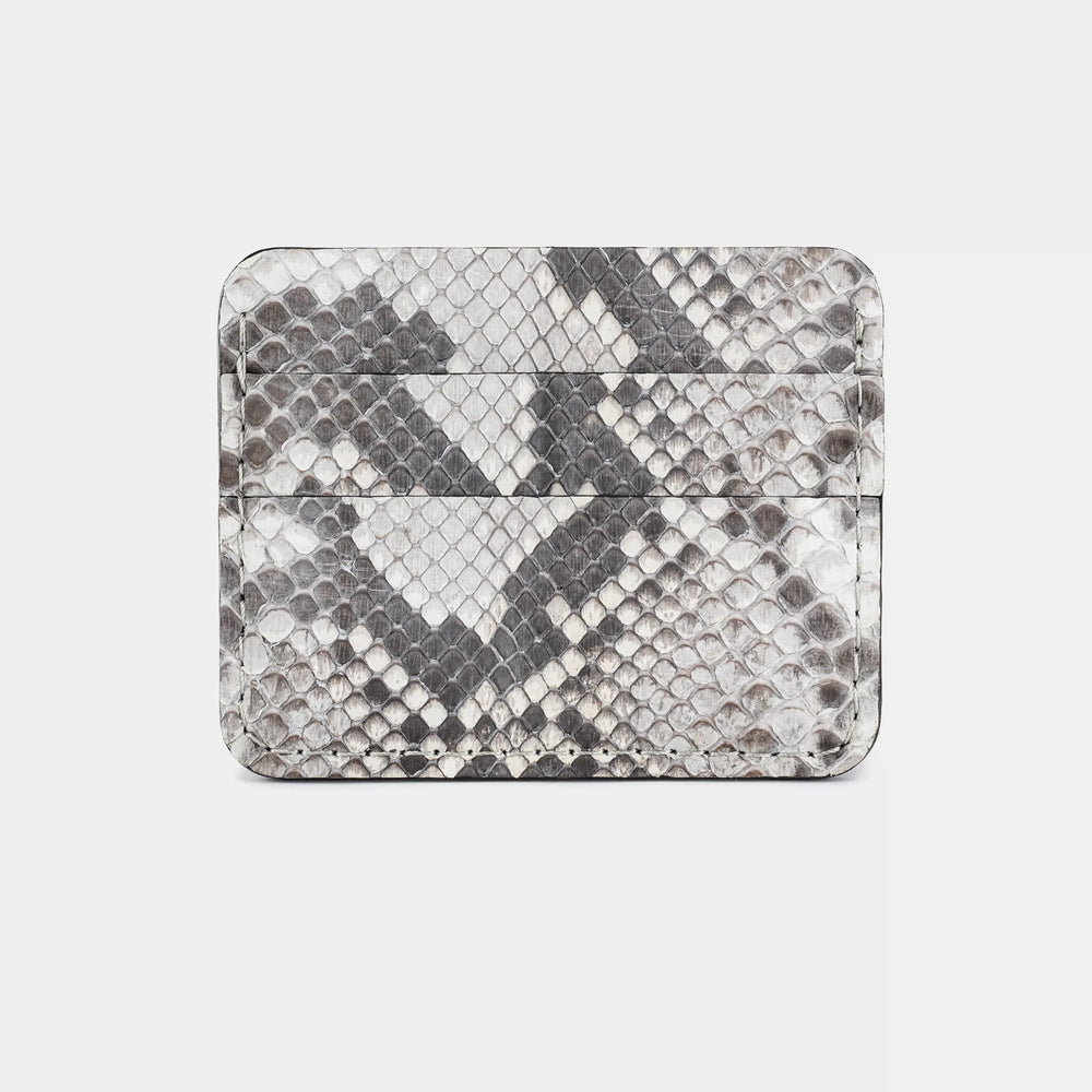 Cardholder made of black and white python leather with small scales