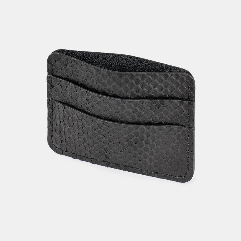 Cardholder made of black python leather with small scales