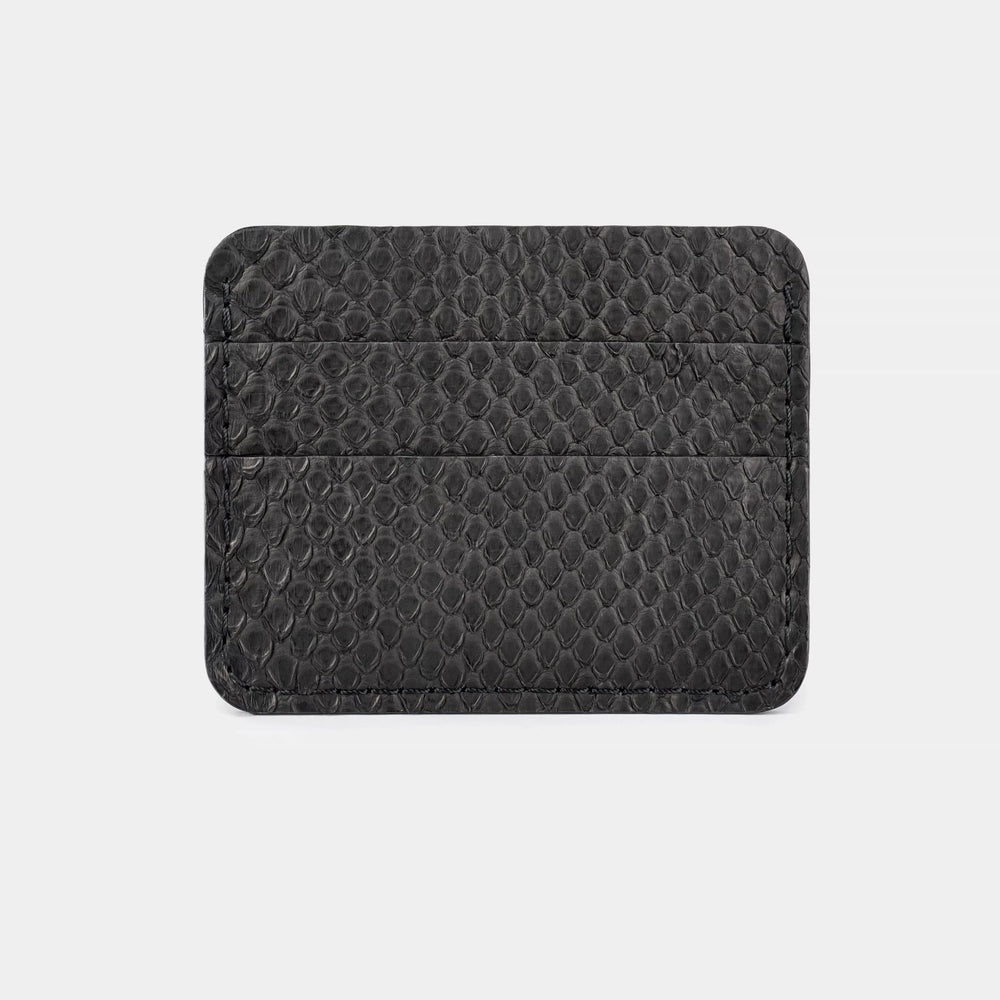 Cardholder made of black python leather with small scales