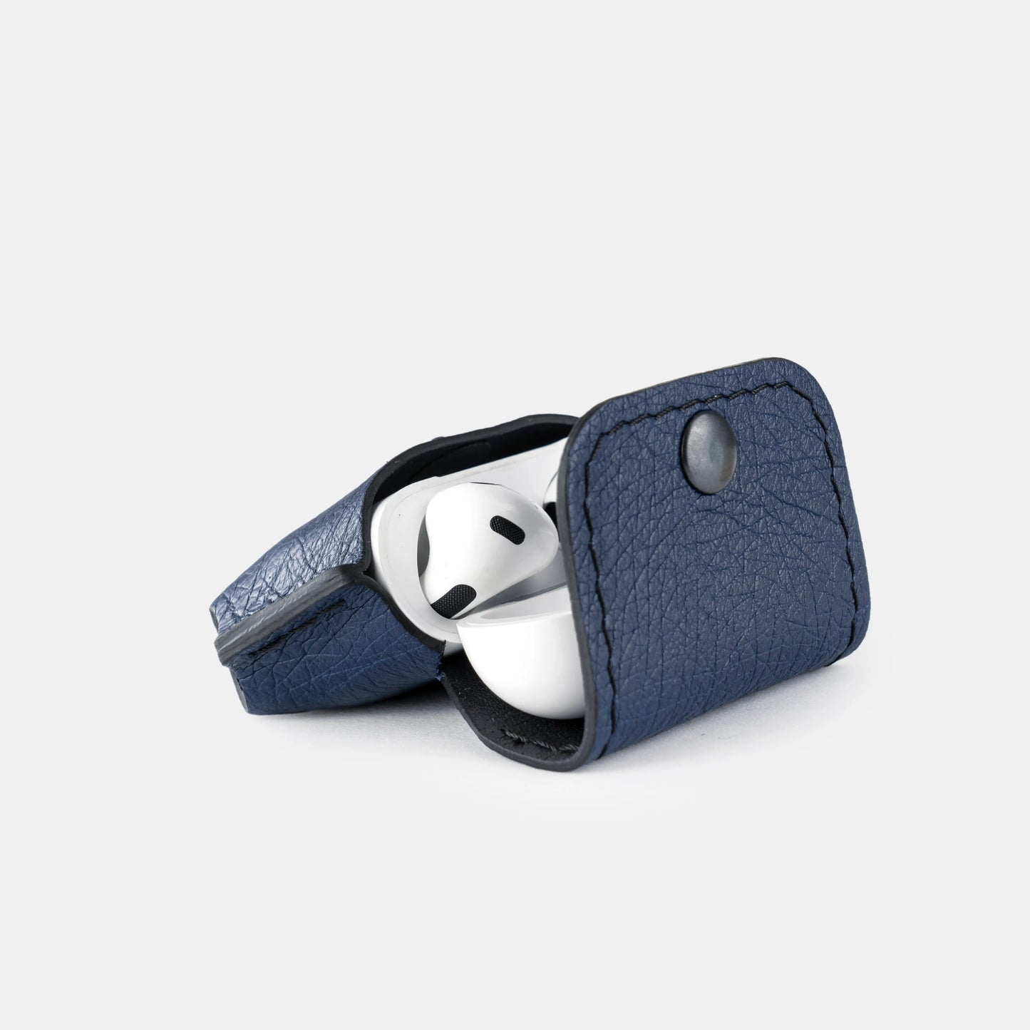 Case for AirPods made of dark blue ostrich leather without follicles