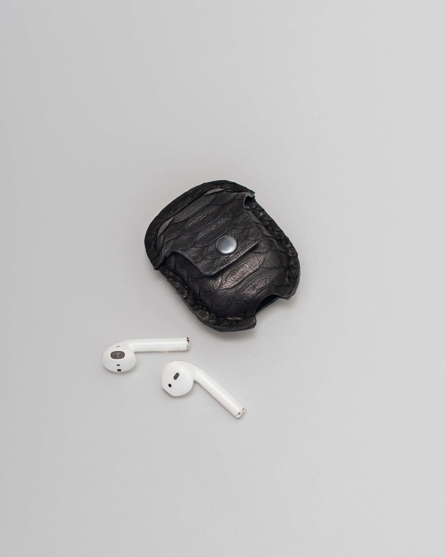 Python leather case for AirPods with wide scales