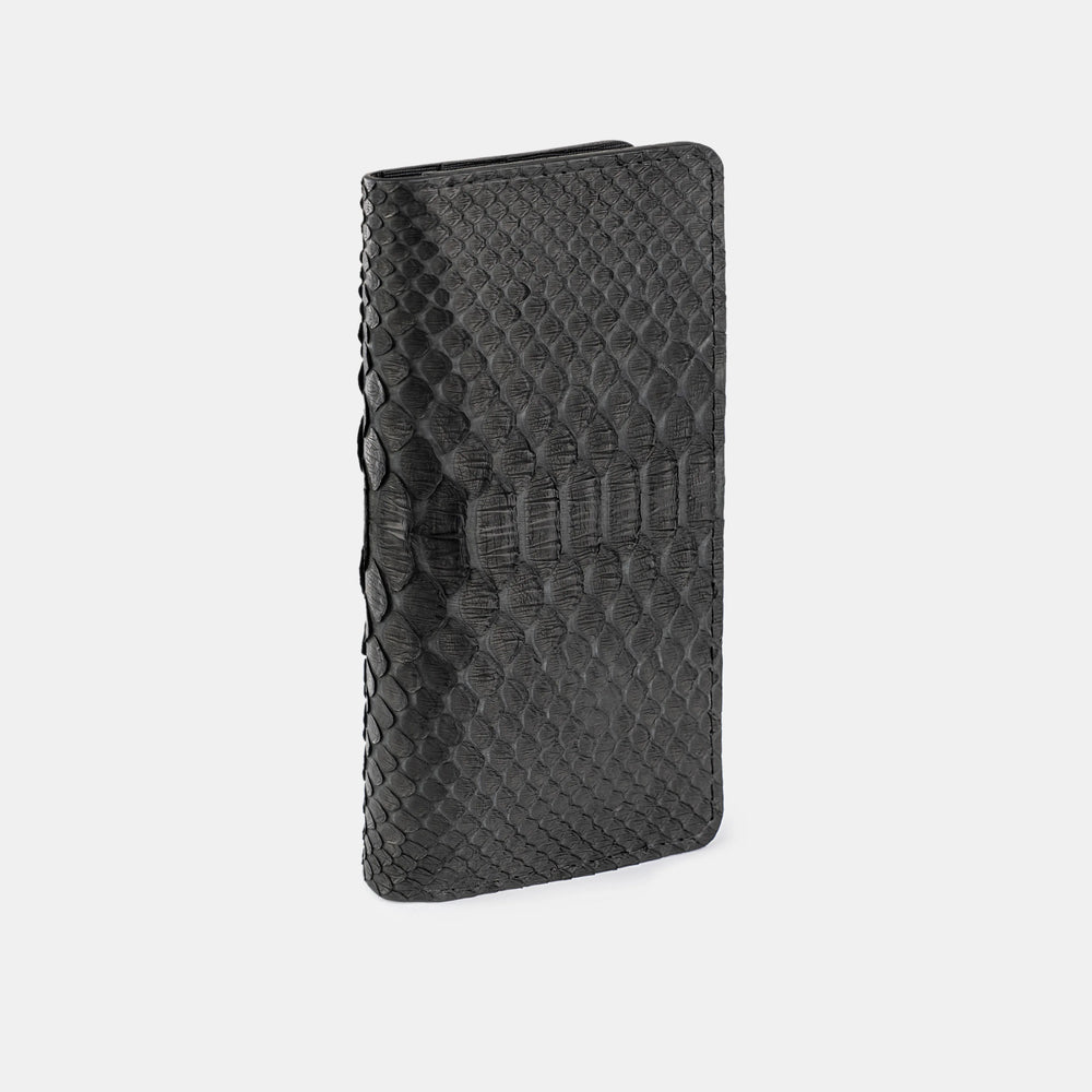 Wallet made of black python leather with wide scales