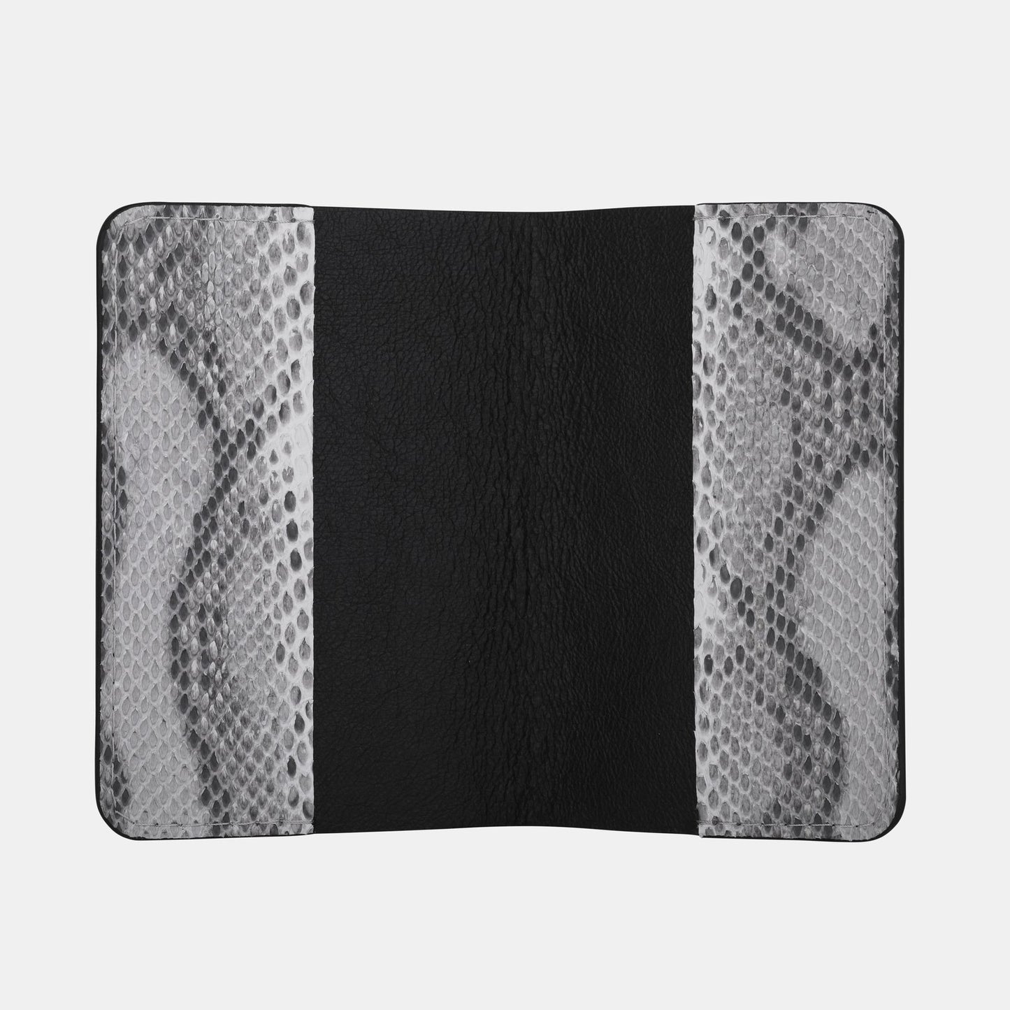 Passport cover made of black and white python leather with small scales
