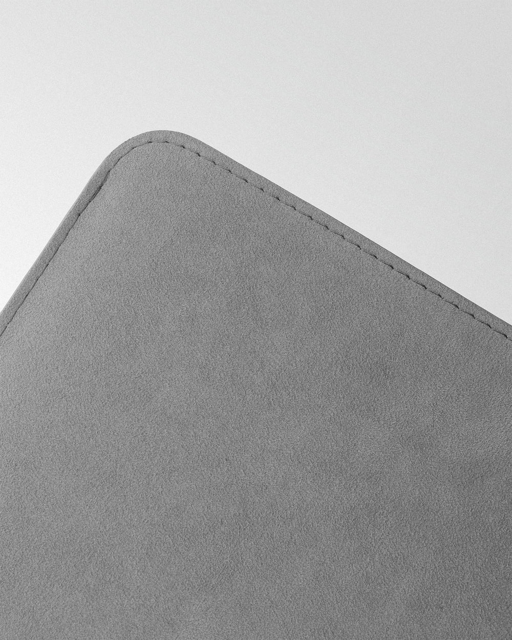 Minimalist case made of light gray alcantara for MacBook