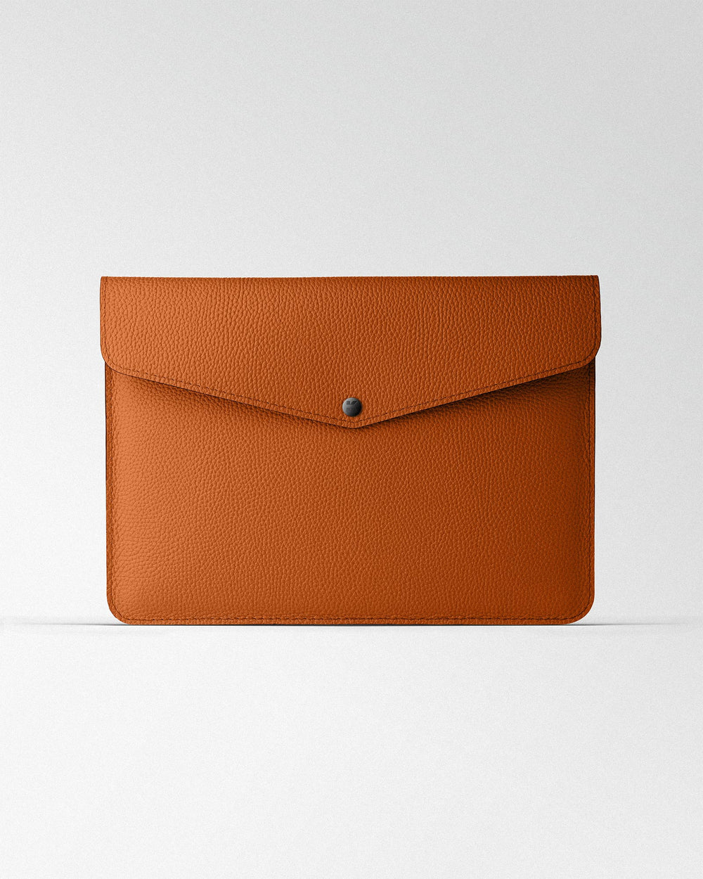 Envelope case made of orange leather for MacBook