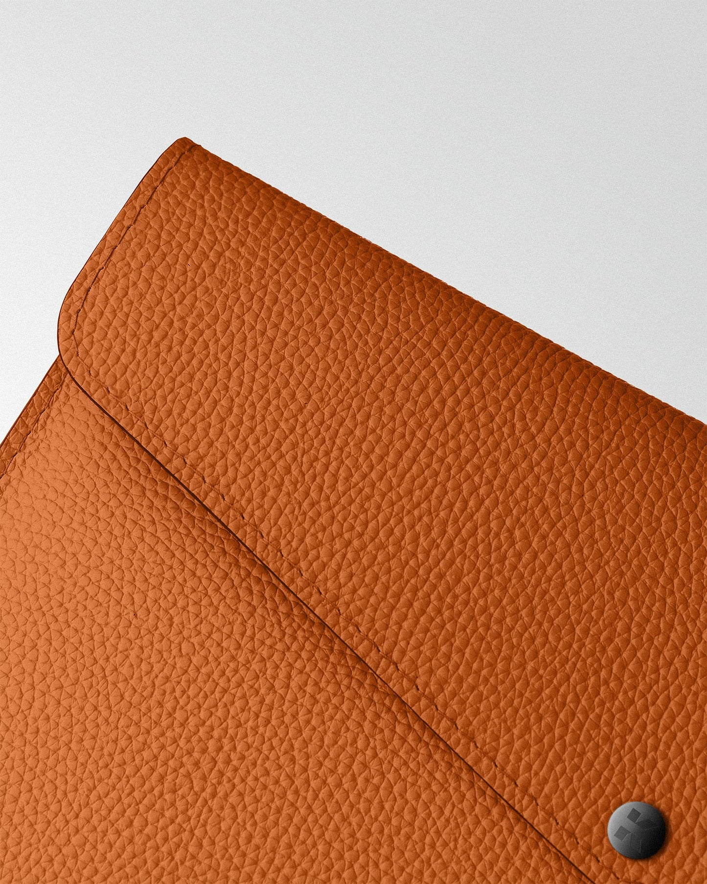 Envelope case made of orange leather for MacBook