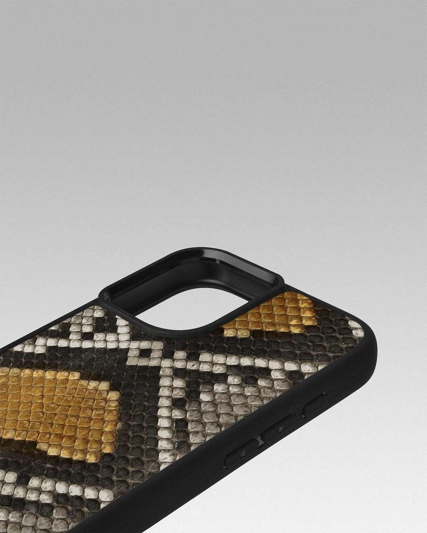 Case made of gray-yellow python leather with small scales for iPhone 16 Plus