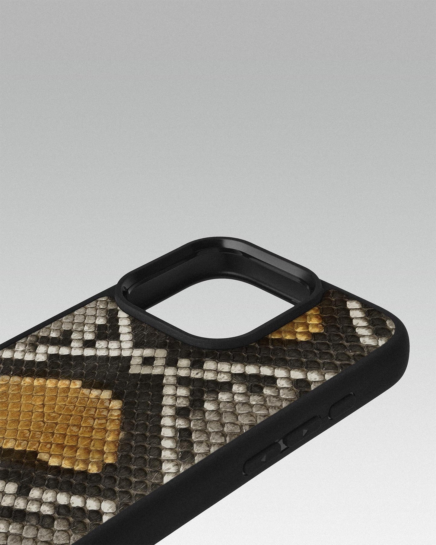 Case made of gray-yellow python leather with small scales for iPhone 16 Pro