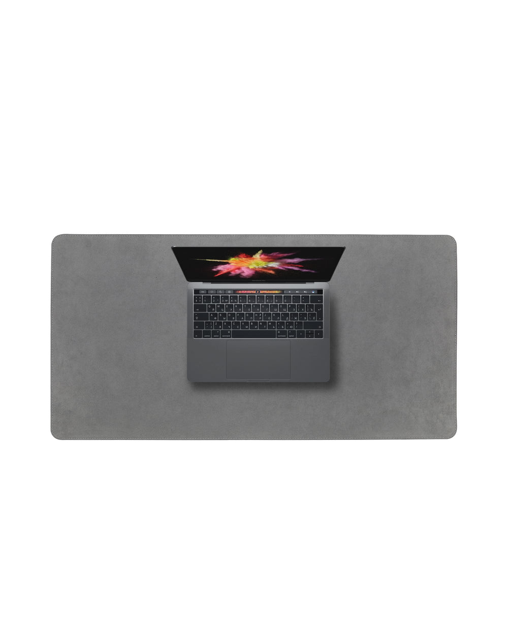 Desk mat made of light gray alcantara