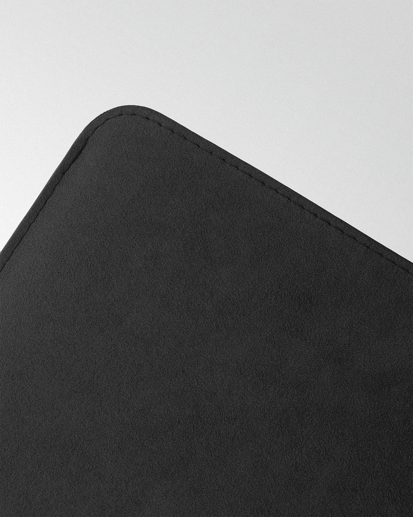 Minimalist case made of black alcantara for MacBook