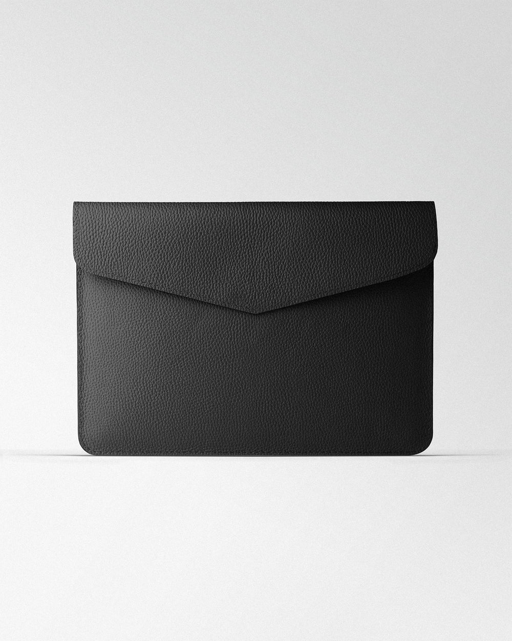 Magnetic Envelope Case made of black textured leather for MacBook