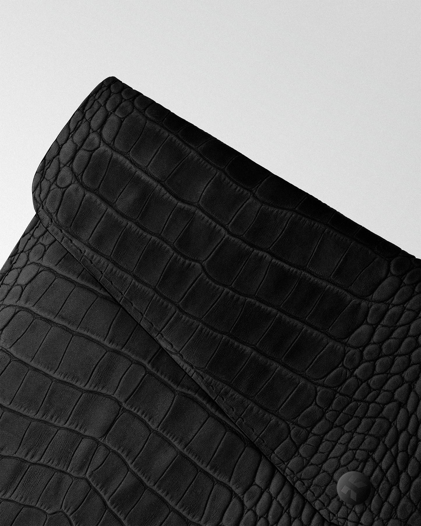 Envelope case with black crocodile embossing for MacBook