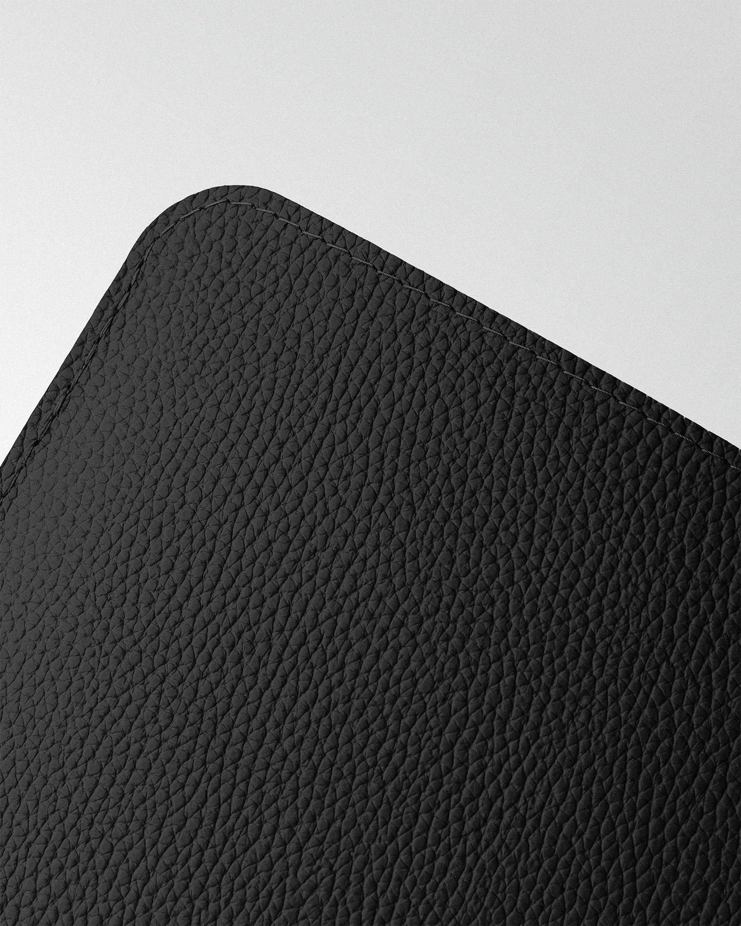 Minimalist black leather case for MacBook