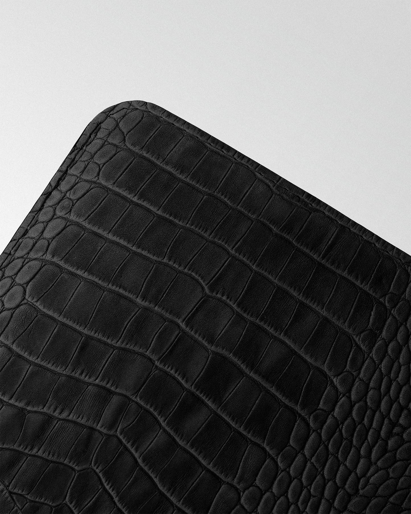Minimalist case with black crocodile embossing for MacBook