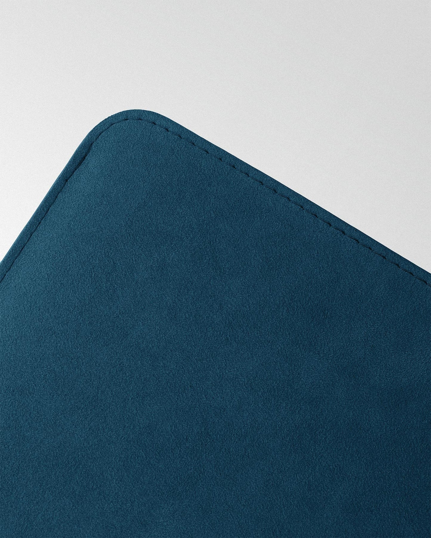 Minimalist case made of blue alcantara for MacBook