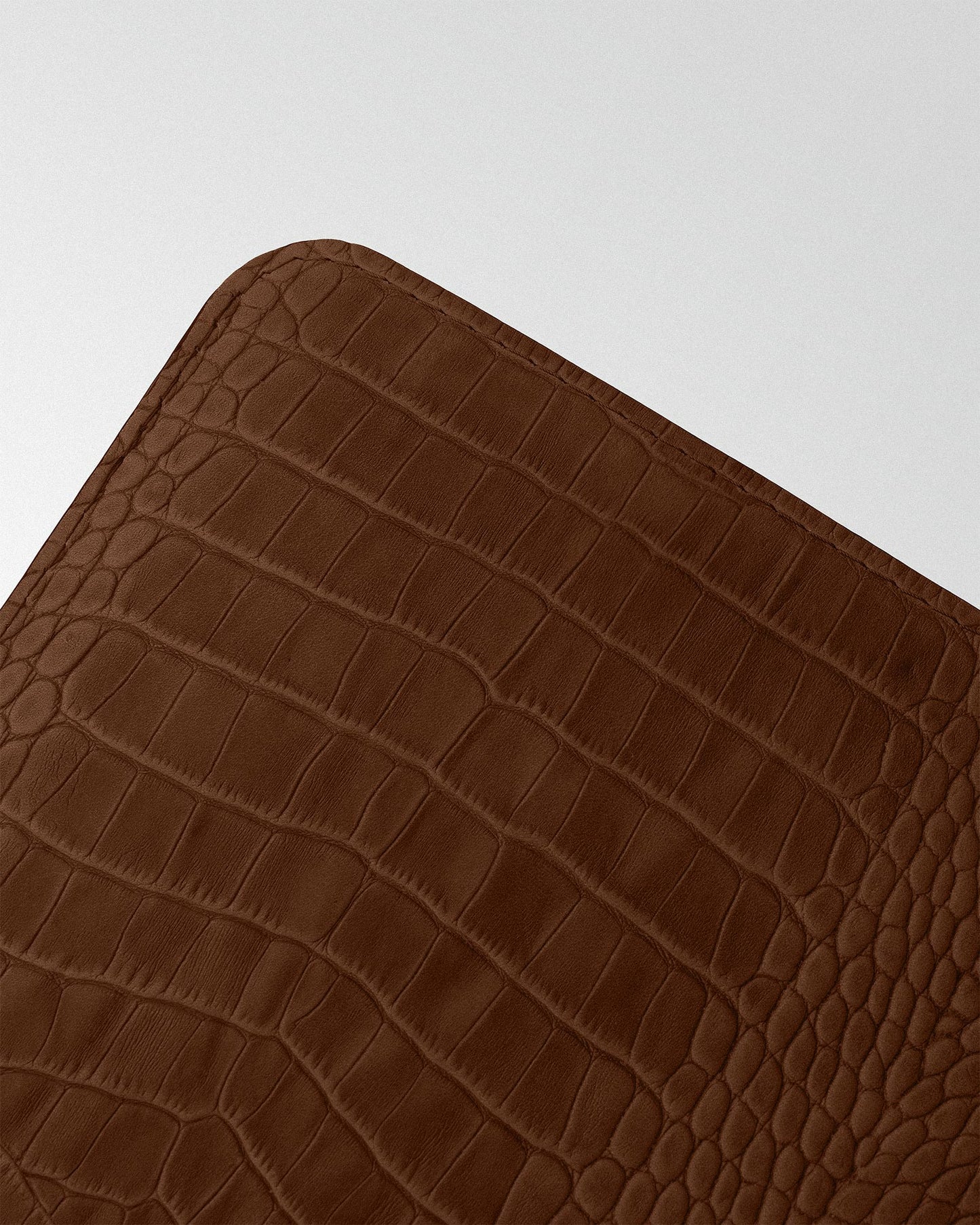 Minimalist case with brown crocodile embossing for MacBook