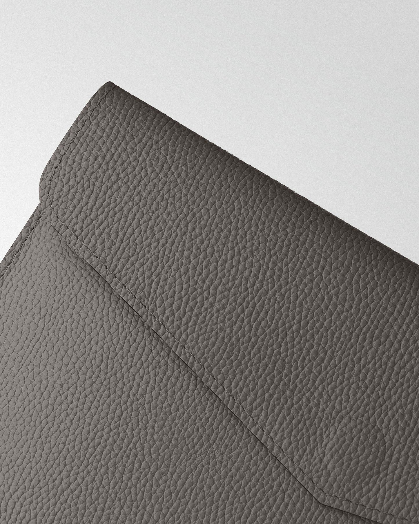 Magnetic Envelope Case made of textured leather in cappuccino color for MacBook