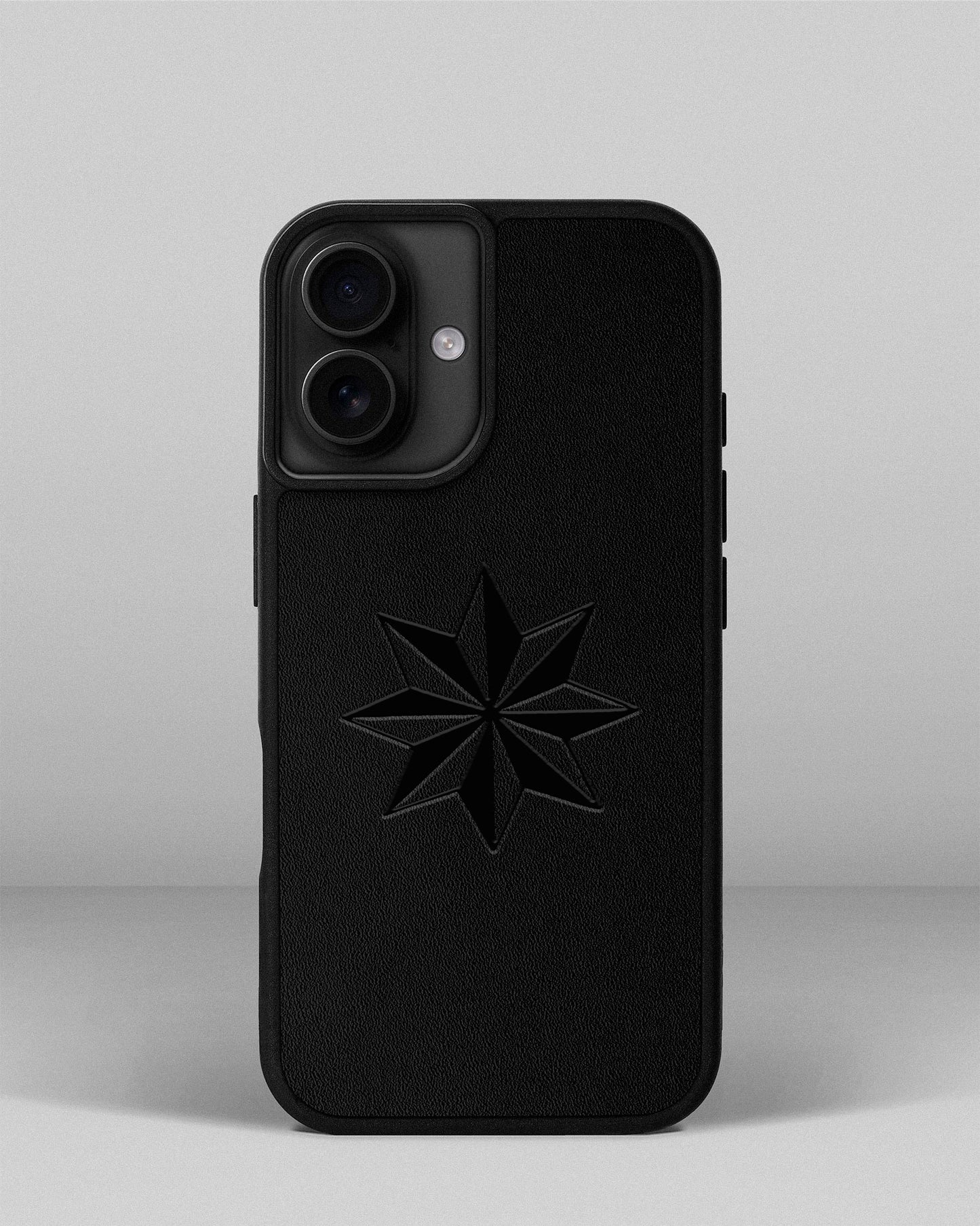 Case for iPhone 16 in black color made of leather with embossed Rose of the Winds pattern coupon