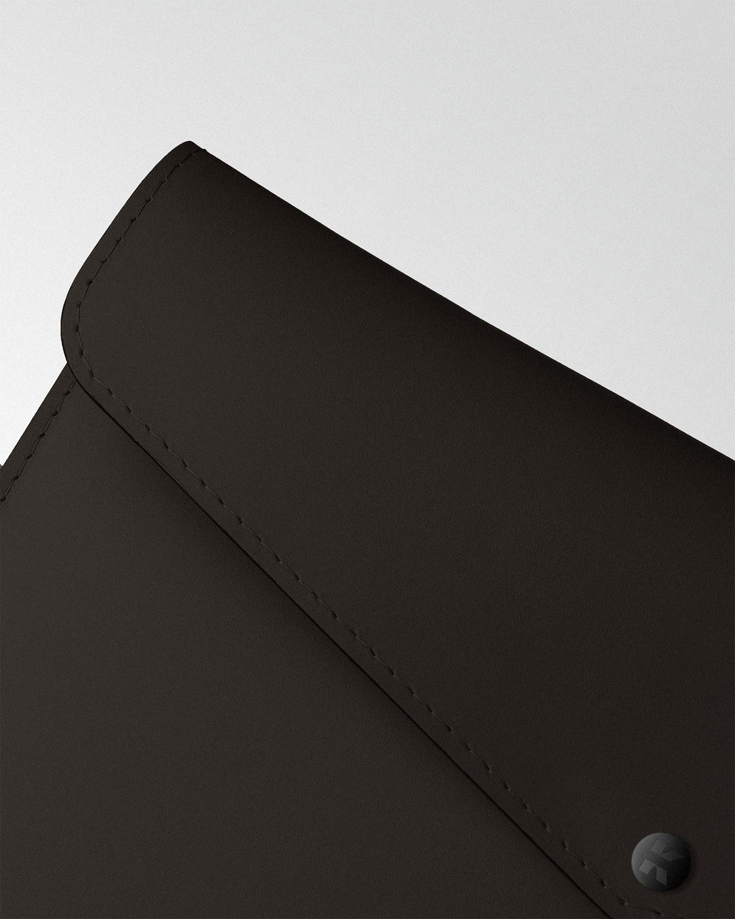 Envelope case in dark brown leather for MacBook