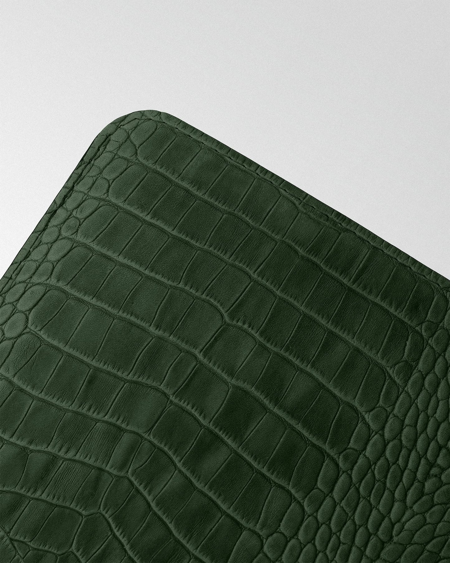 Minimalist case with green crocodile embossing for MacBook