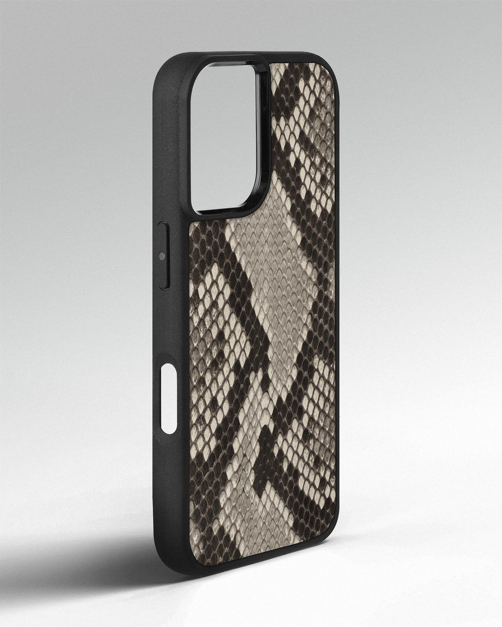 Case made of black and white python leather with small scales for iPhone 16